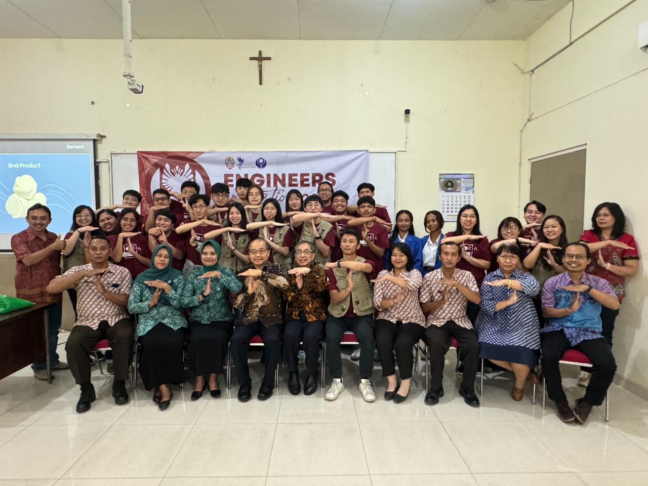 A group photo of guests attending the opening ceremony of the " Engineers in Action " project co-organized by Widya Mandala Catholic University and National Taiwan University of Science and Technology